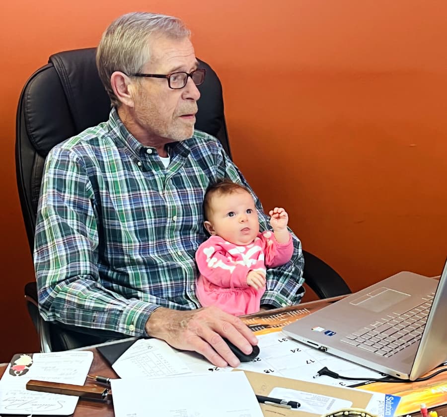 Steve Shelton at his desk in the original Springfield shop, 2003